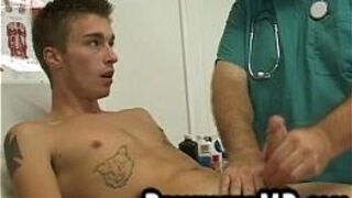 A sexy patient hunk is jerked off by the bear doctor porn video